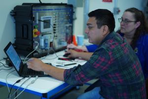 Student learns about industrial electricity 