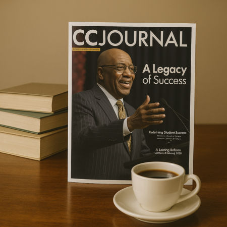image of the Community College Journal cover with books and coffee on a desk